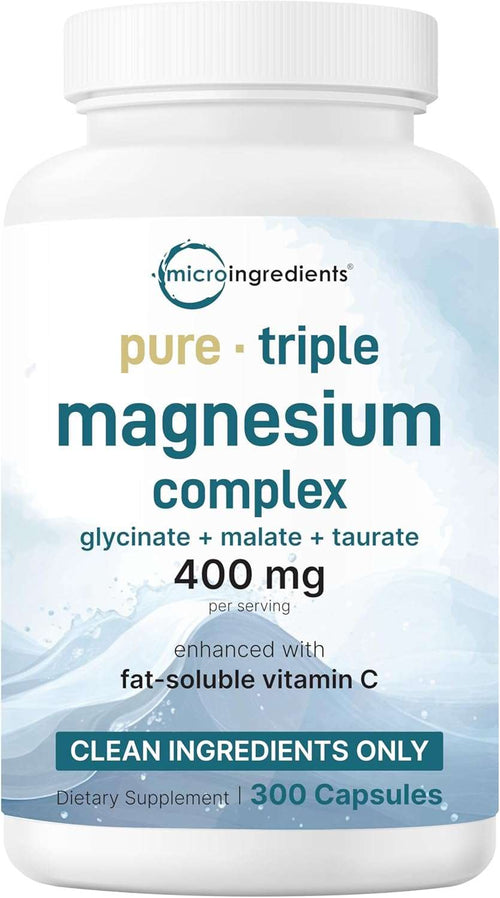 Pure Magnesium capsules in a white bottle with a green and white label.